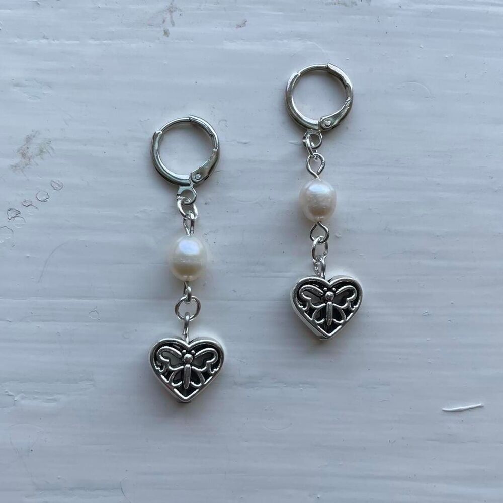 Women's Silver and Cream Jewelry